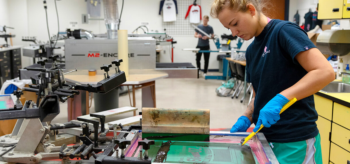 FHTC Graphic Arts Technology student in screen printing lab