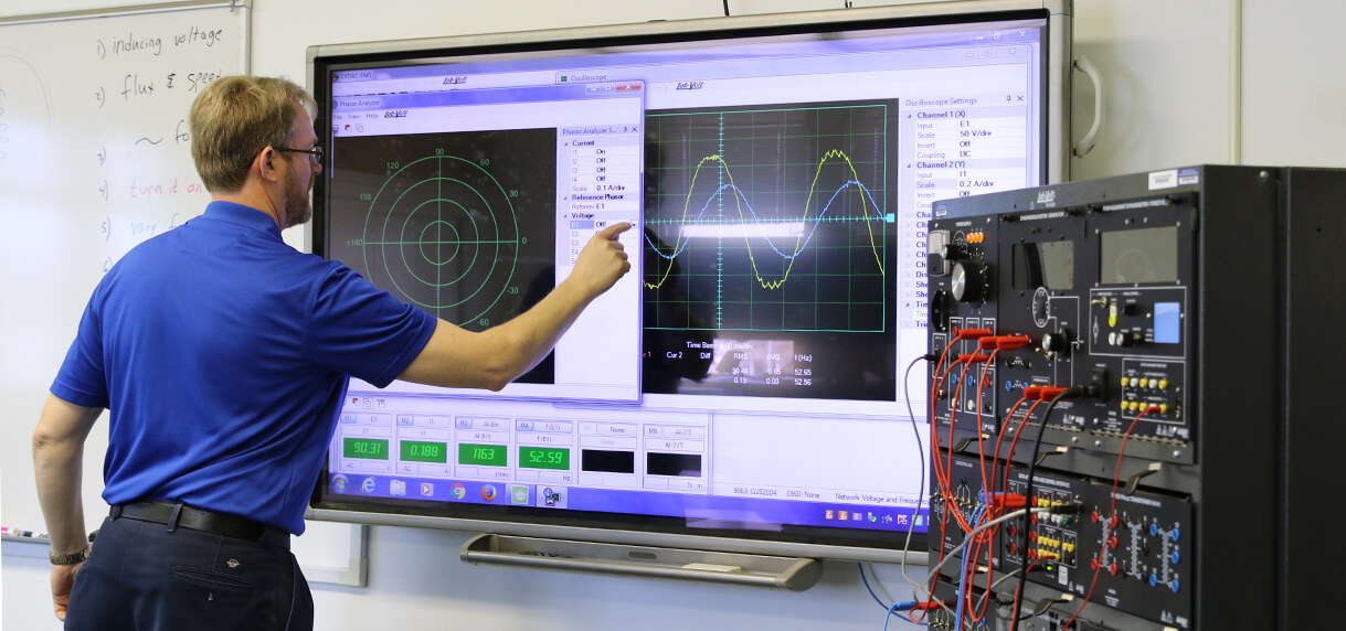 Power Plant Technology instructor at touch board
